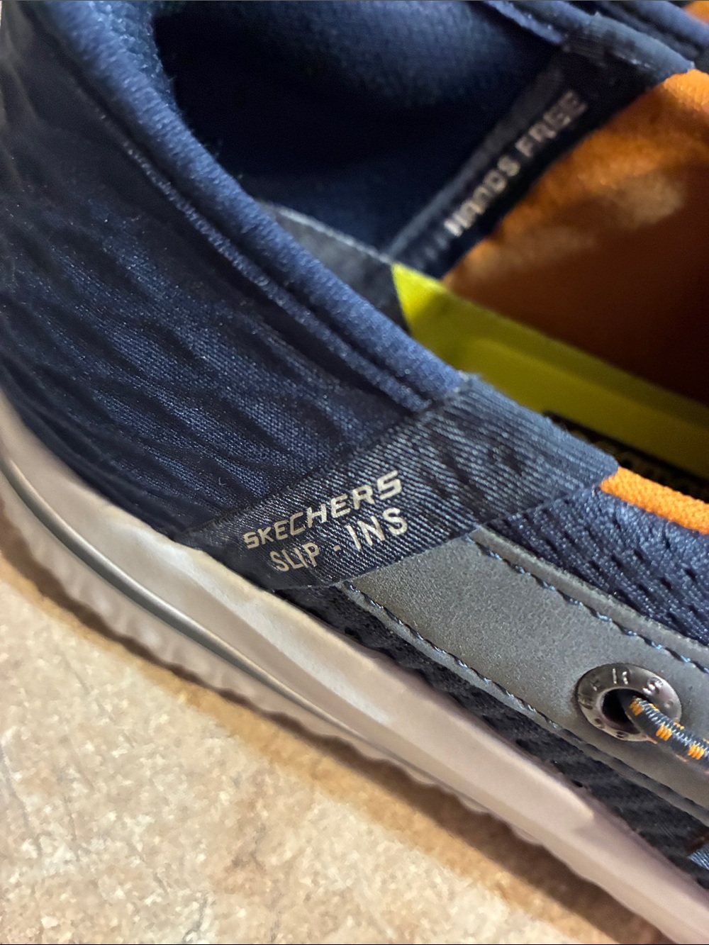 Skechers Men's Size 12 Navy Knit Slip-On Sneakers with Orange Liner - Picture 9 of 11
